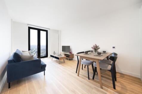 Experience sophisticated urban living with this beautifully arranged living and dining area.