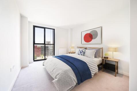 Experience modern comfort in this beautifully designed bedroom with spectacular city vistas.
