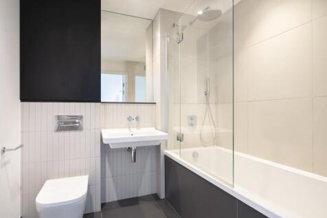 Experience luxury in this sleek bathroom designed with minimalist aesthetics.