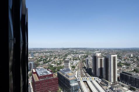 Experience urban living with this spectacular city view from your highrise apartment.