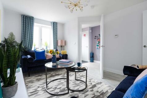 Large window floods the room with natural light