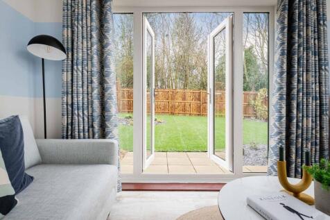 French doors open out to the garden, perfect on warm days