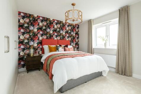 The main bedroom is complete with its own ensuite shower room