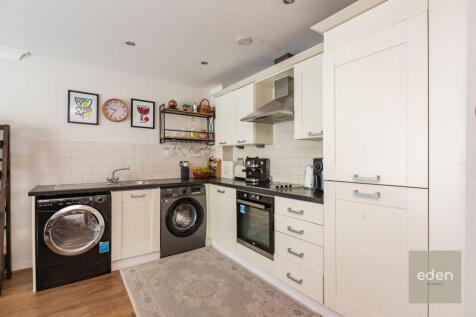 Lounge open plan to Kitchen