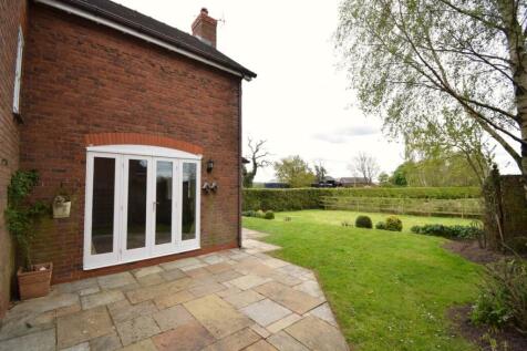 Rear patio and garde