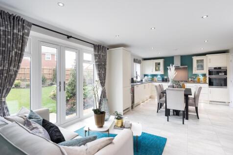 Open-plan kitchen with family/breakfast areas