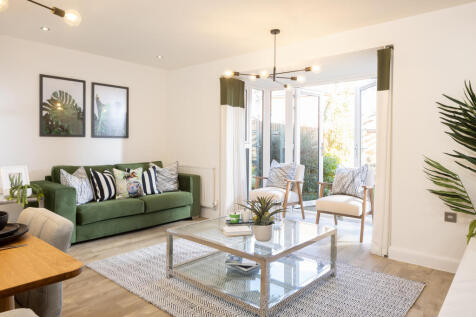 Lounge with French doors in the Woodcote 4 bedroom home