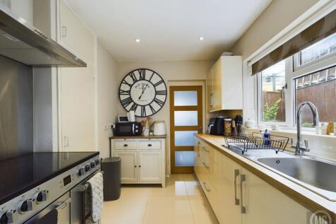 Kitchen leading into Utility