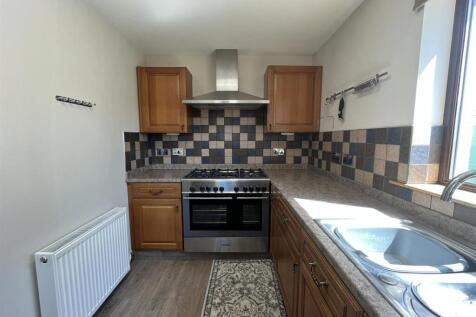 OPEN PLAN DINING KITCHEN/UTILITY ROOM