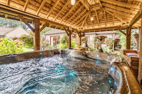Covered hot tub house