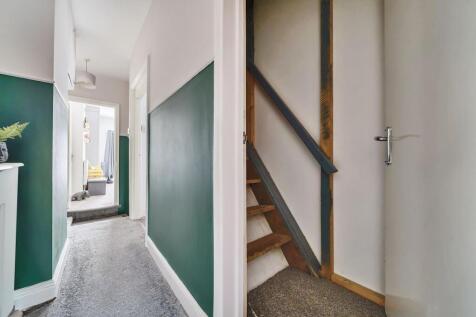 First floor landing with door leading to loft conversion
