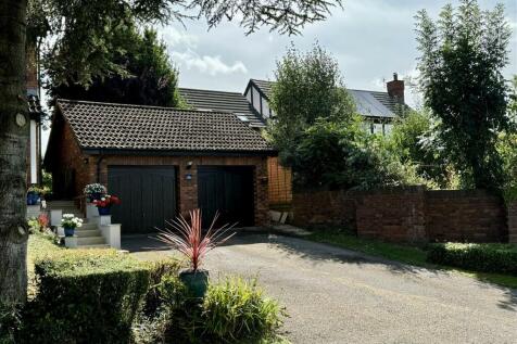 Detached Double Garage and Parking