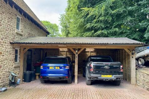 Detached Double Garage and Driveway &amp; Carport