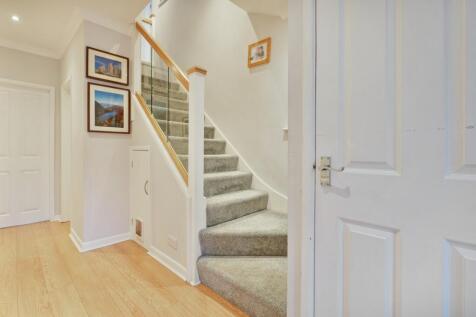 Hallway with stairs to first floor