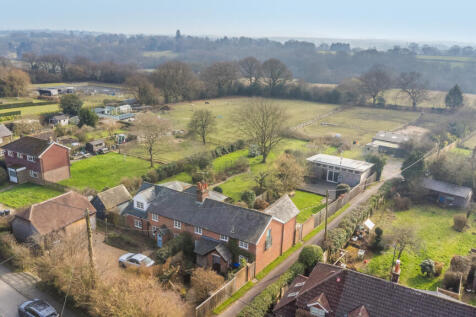 Aerial view of the house, garden, parking, outbuilding and views