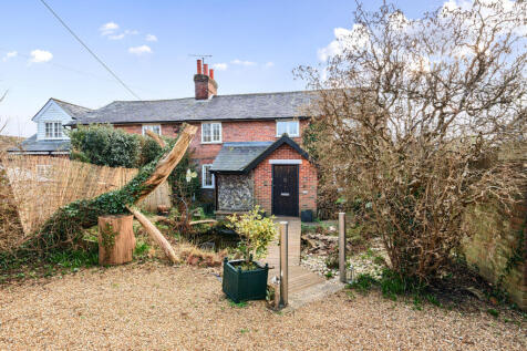 Front elevation, front garden and parking for one vehicle