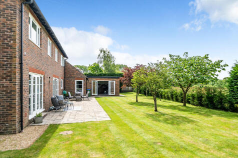 Rear terrace and South West facing private rear garden