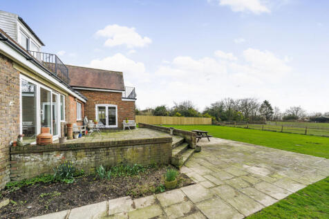 Large private South Facing rear terrace and rear garden