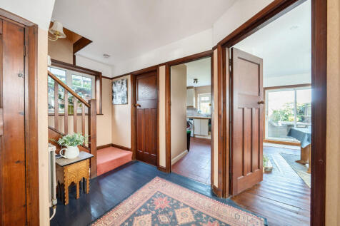 Hallway with downstairs cloakroom