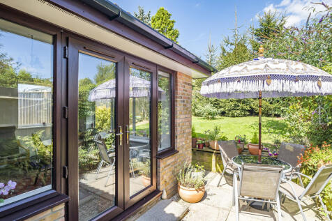 Garden patio with door into dining area