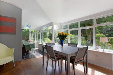 Centrally heated large Garden Room with stunning views over the south facing garden and privately owned woodland