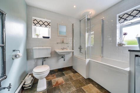 Ground floor bathroom / utility room with underfloor heating and plumbing for washing machine