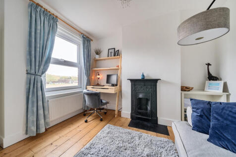 First floor Bedroom 3 / Study with feature fireplace