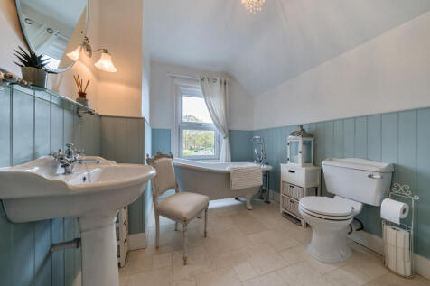 First floor recently added and beautifully presented bathroom with large walk in shower and stand alone roll top bath