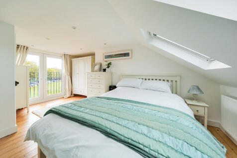 Second floor Master bedroom with en-suite shower room and Juliette balcony providing wonderful elevated views