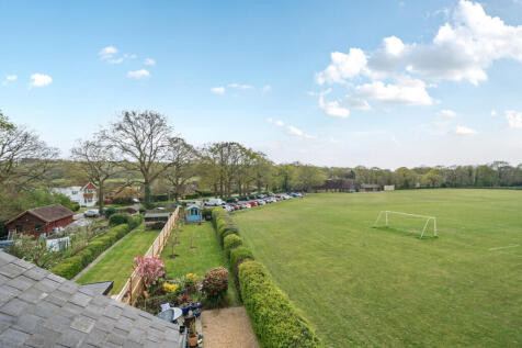 100ft South facing rear garden with private gate providing direct access onto adjacent recreation ground