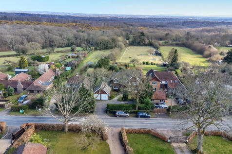 Aerial view showing the house, countryside and Ashdown forest within easy walking distance