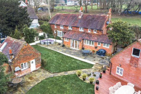 Rear elevation, South East facing rear garden, detached Guest / Annexe and large detached garage