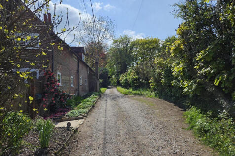 The house and school lane which is a quiet no through country lane with direct access to Ashdown Forest