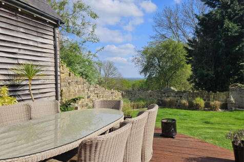 Decked outside seating area with wonderful views over Ashdown Forest