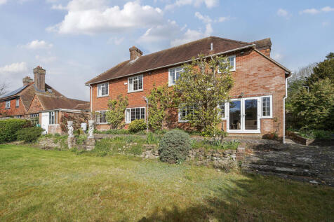 Rear elevation and South facing rear garden and terrace