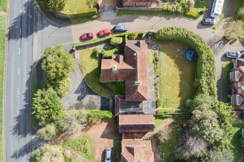 Aerial view of the house and plot