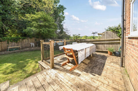 South facing rear garden and decking with elevated views over Reedens Meadow