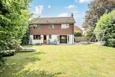 Rear elevation and private, secluded and family friendly rear garden