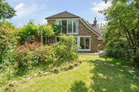 Private and secluded West facing rear garden and rear elevation