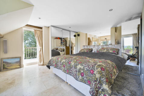 Master bedroom with en-suite, balcony and juliette balcony providing uninterrupted views over Ashdown Forest