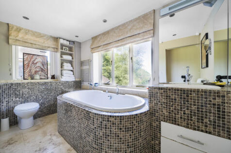 Master bedroom en-suite bathroom with a separate shower room the other side of the bedroom
