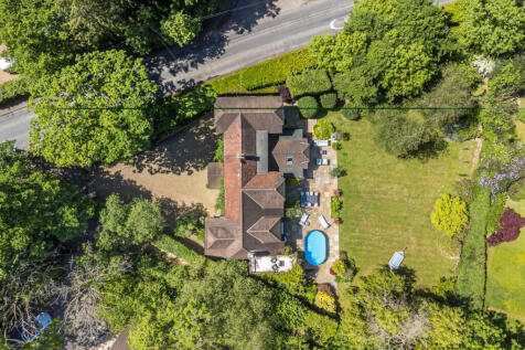 Aerial view of the house and plot