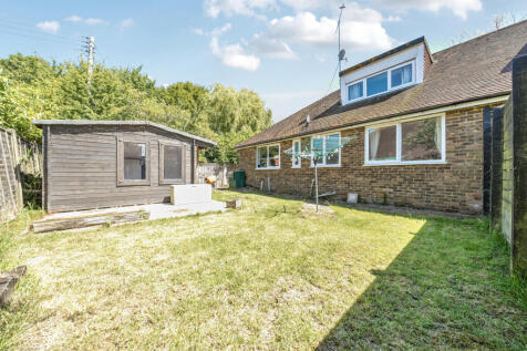 West facing private rear garden and outbuilding with potential to be used as a home office/games room or annnexe