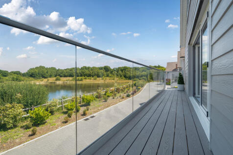 Living Room balcony with views over the lake