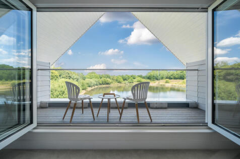 Master Bedroom balcony with views over the lake