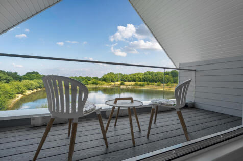 Master bedroom balcony with stunning views over the lake