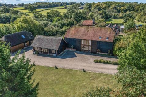 Elevated view of the house, garden/games room and detached craft room/garage/potential annexe