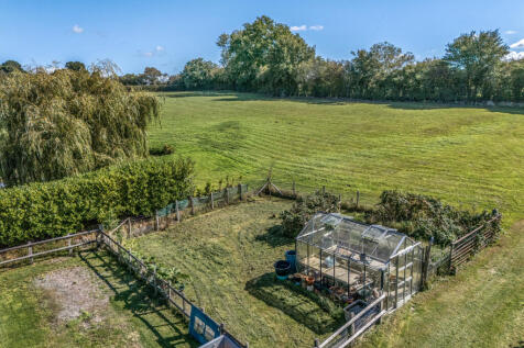 Greenhouse, allotment area, and top field with Cow Shed, and two ponds