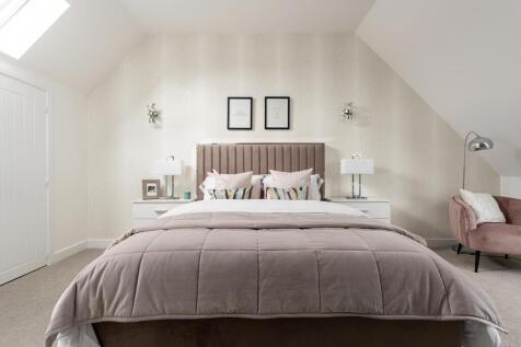 The main bedroom enjoys seclusion on the second floor
