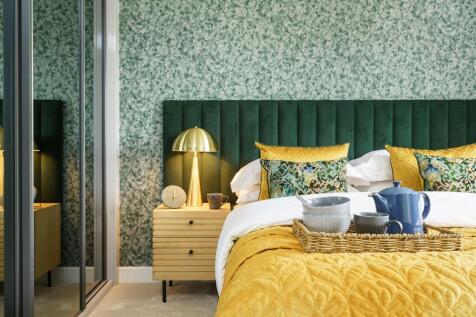 The main bedroom is spacious with lots of space for storage